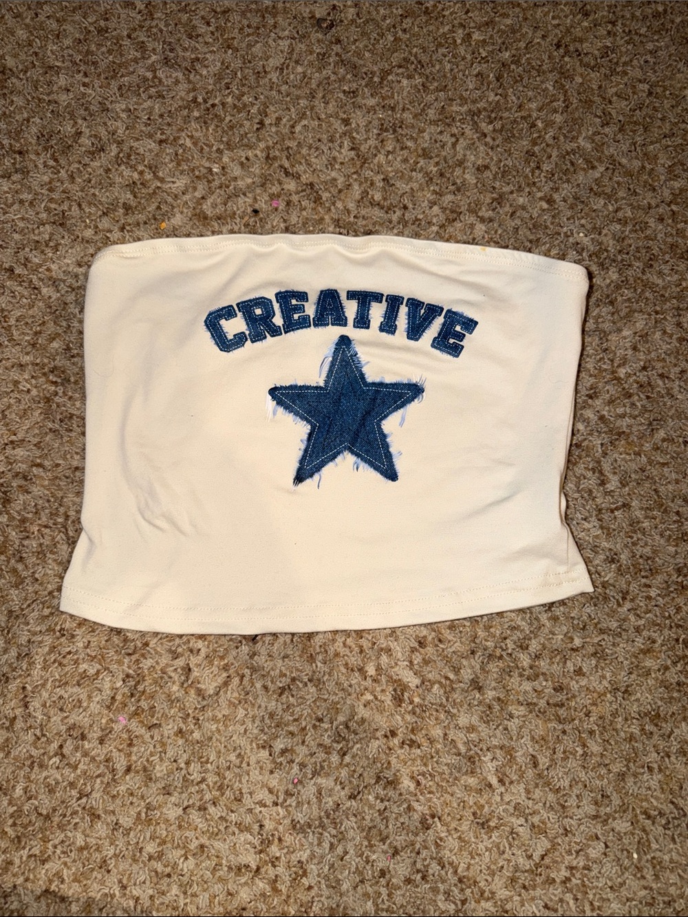 shein tube top features a star and the word "CREATIVE" in a collegiate style